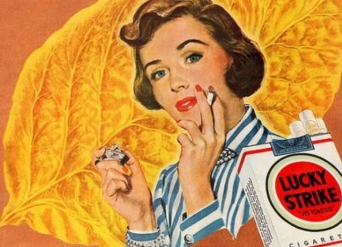 Vintage Lucky Strike cigarette advertisement featuring a stylish woman lighting a cigarette against a backdrop of a large golden tobacco leaf. - 40s and 50s Graphic Design