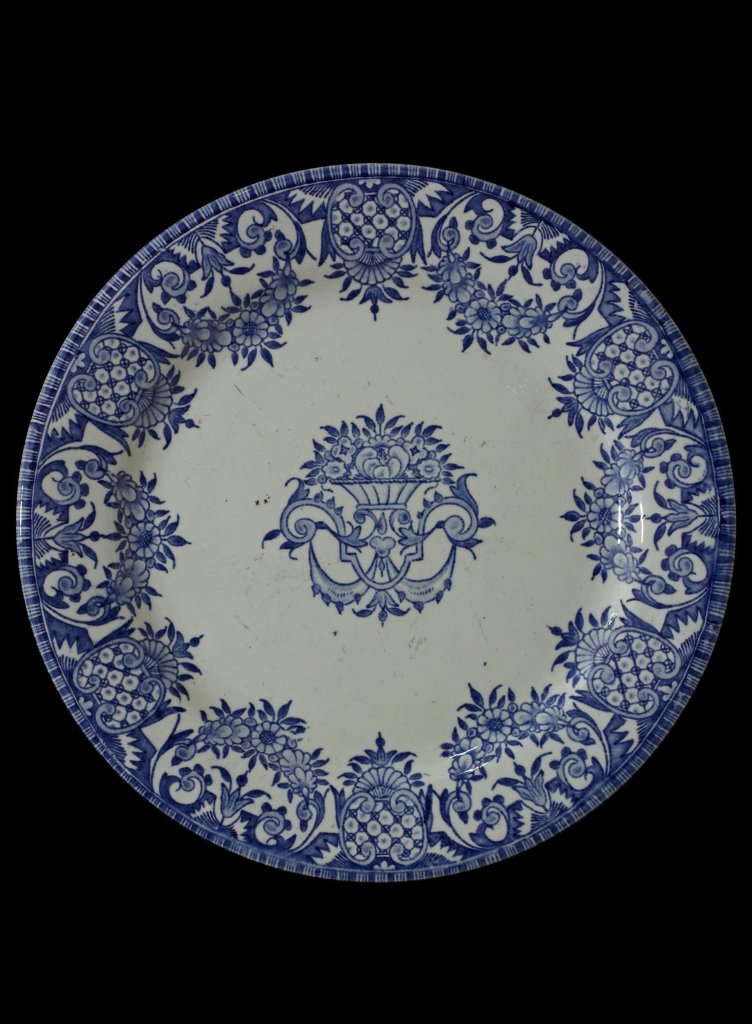 Plate painted blue. Gien Pottery (V and A)