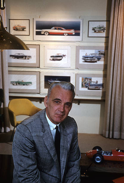 Automobile: Portrait of Chrysler chief stylist Virgil Exner posing at his desk