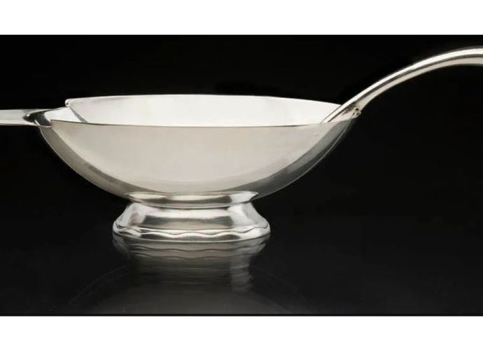 Sauceboat and spoon byCarl Fjerdingstad