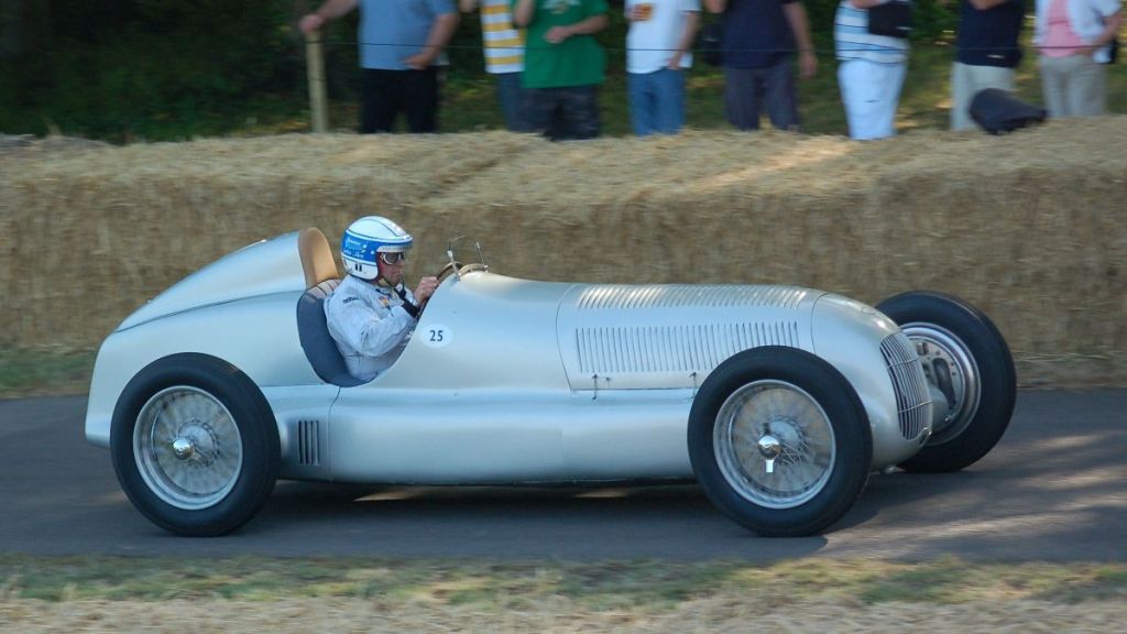Jochen Mass demonstrating a 1934 Mercedes-Benz W25 at the Goodwood Festival of Speed.
