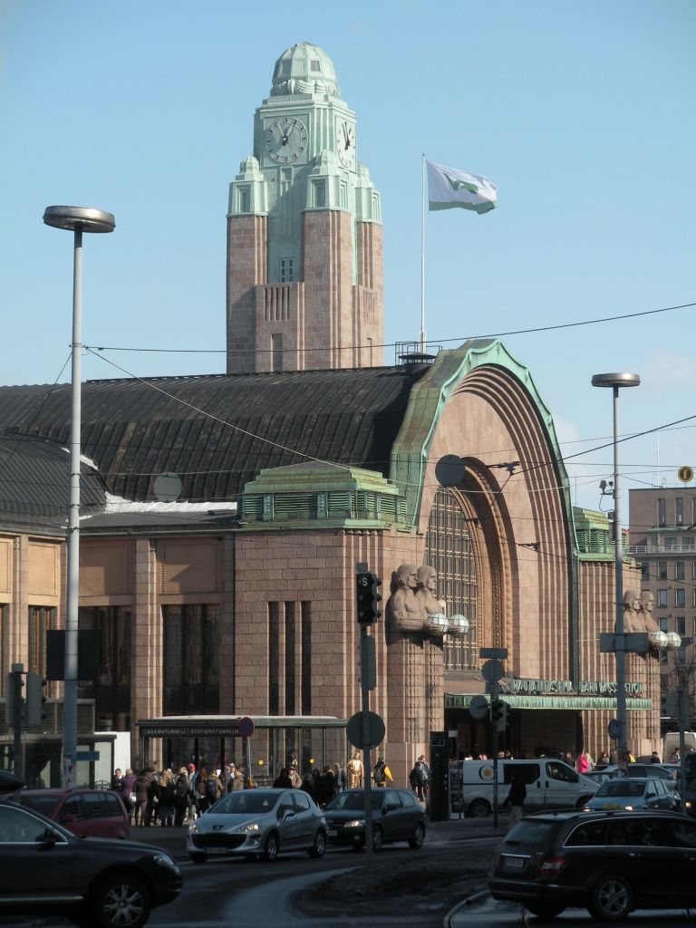 This image shows the front entrance and clock tower of Helsinki Central Station on 23 March 2013.