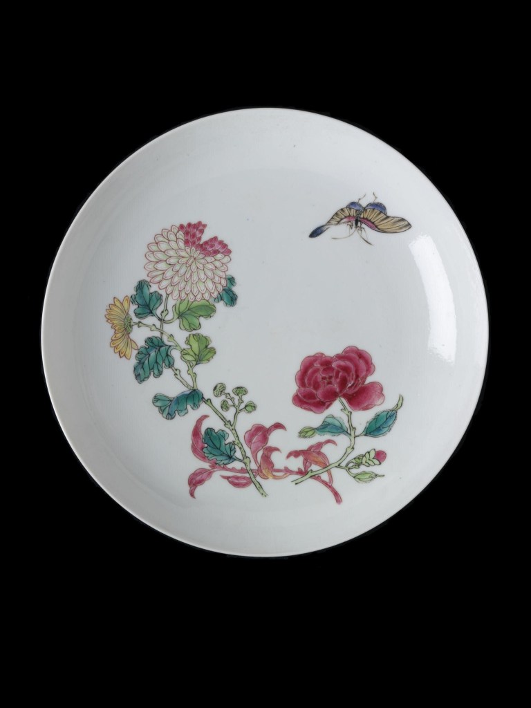Dish of 'eggshell' porcelain, painted in overglaze enamels in the famille rose palette with a chrysanthemum spray, a peony and a butterfly.