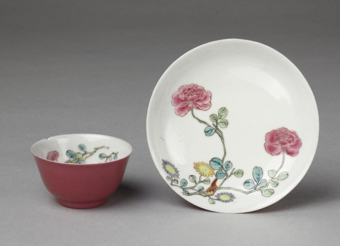 Cup and saucer of 'eggshell' porcelain, painted in overglaze enamels in the famille rose palette