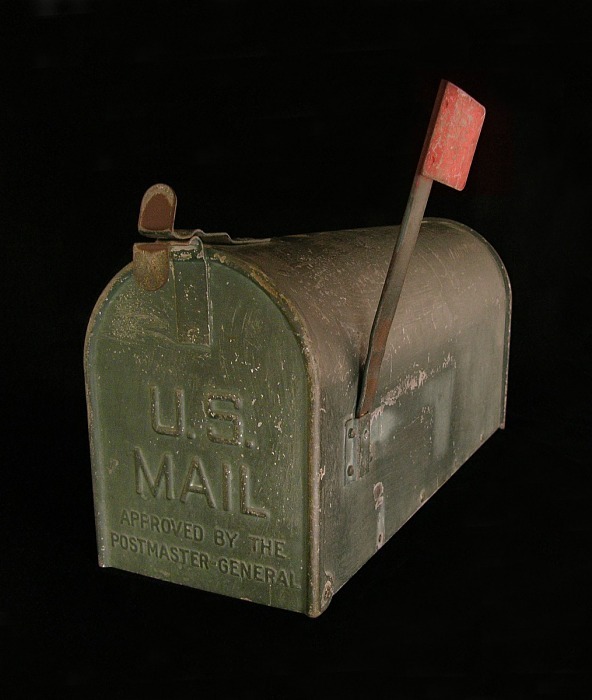 Green hemispherical mailbox, an approved Rural Free Delivery original design from 1915.