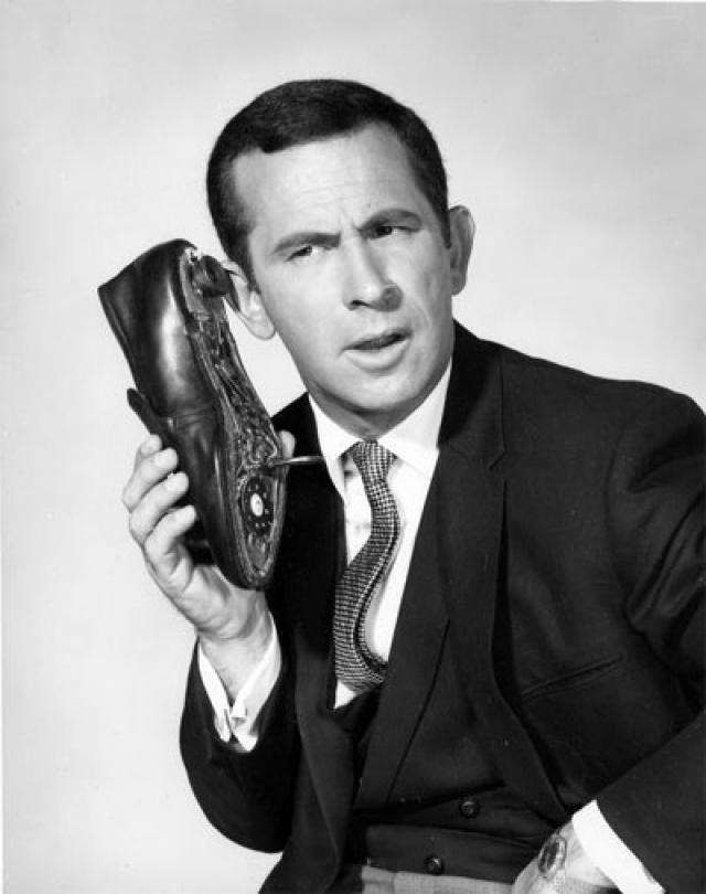 Get Smart character Maxwell Smart (Don Adams) using his signature shoe phone