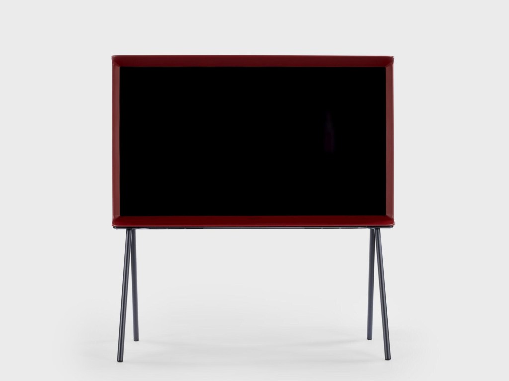 Front view of the Serif TV (2013-2015), designed by Ronan and Erwan Bouroullec for Samsung, featuring a bold I-shaped frame in red with a sleek black screen.