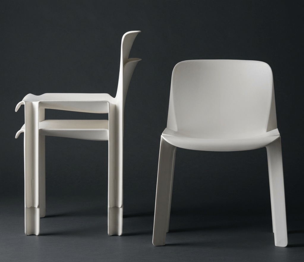 Piero De Martini Emme Uno stackable chair for B&B Italia, shown in white with rounded shell seat and compact stacking profile.
